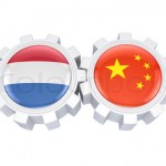 5990128-232664-dutch-and-chinese-flags-on-a-gears